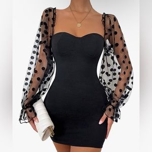 Cute black dress with polka dot sleeves